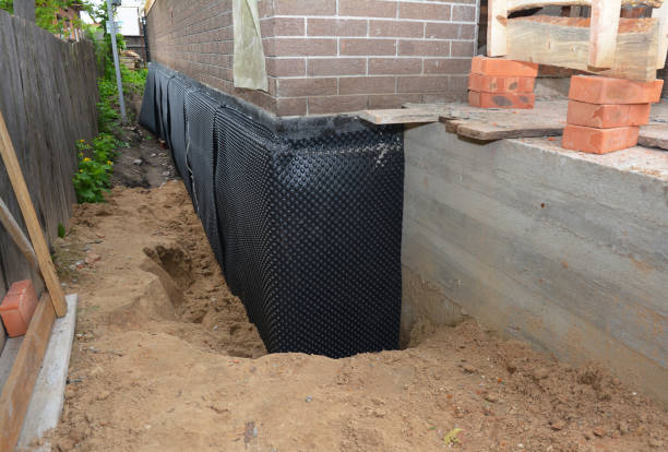 SJ Waterproofing Pros technician performing targeted Sump Pump Installation assessment in Marengo, IL
